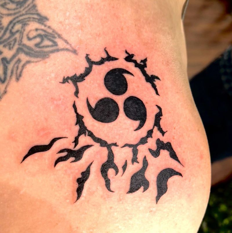 Bold black anime curse-mark design on the ribs
